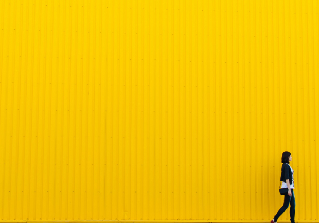 large yellow wall and woman photo