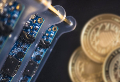 computer chip and coins