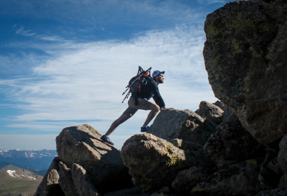 photo of a man climbing