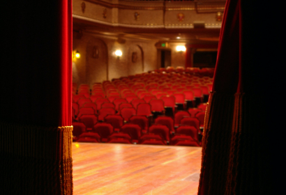photo-of-stage-in-a-theater-hall