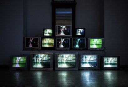 distorted photo of multiple televisions