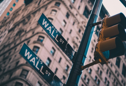 photo of wall street street sign