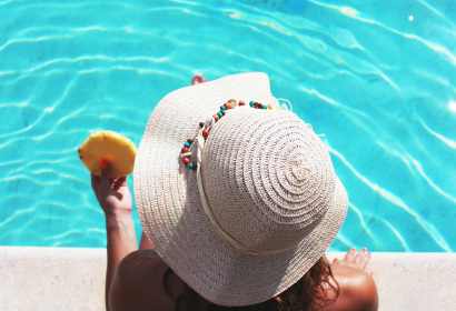 photo of a woman at poolside
