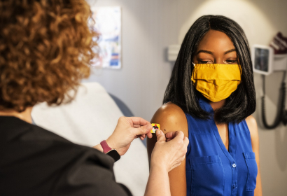 Woman Receiving Vaccine