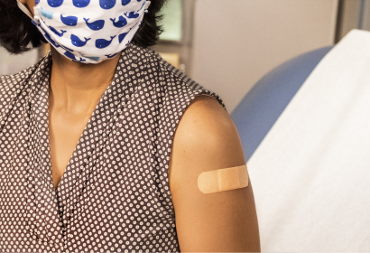 Image of Masked Woman After Vaccine